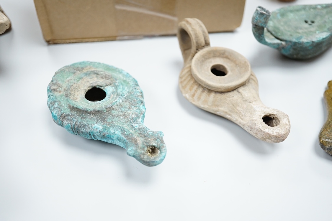 A pair of Turkish bath shoes, a collection of African beads and Middle Eastern vessels etc.